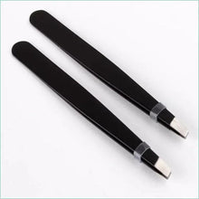 Pair of black slant-tip eyebrow tweezers with pointed tips.