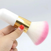 Large blush/contour brush with white handle, gold ferrule, and soft pink bristles