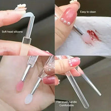 Silicone makeup applicator brushes with soft white tips and clear protective caps