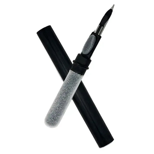 Computer cleaning kit tools with foam-tipped brush and scraper handles, black and gray.