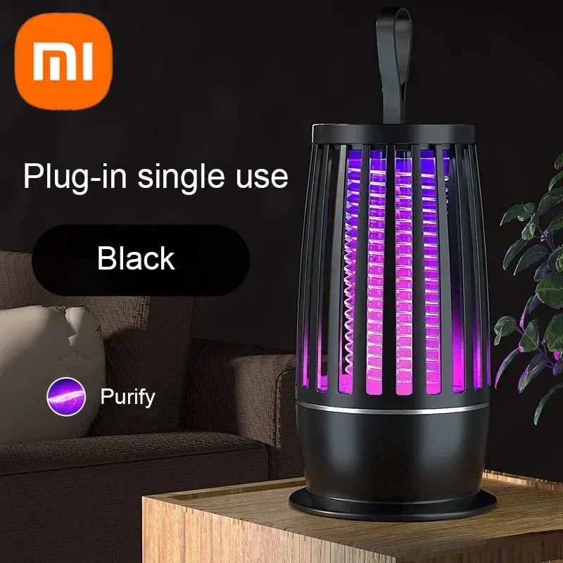 Black electric mosquito trap lamp with hanging handle and purple light grid