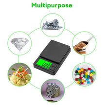 Digital pocket scale with green backlit LCD displaying 0.000