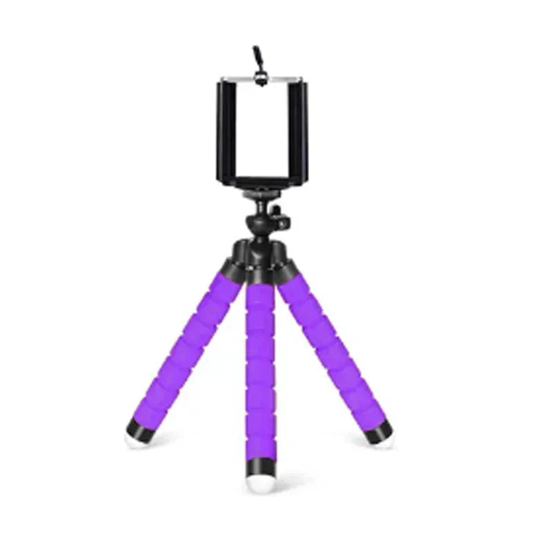 Mini phone tripod with flexible purple legs and black phone holder mount