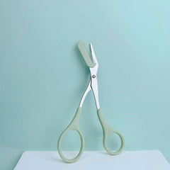 Pink eyebrow trimming scissors with built-in comb - stainless steel, precise grooming tool, creating perfect eyebrows