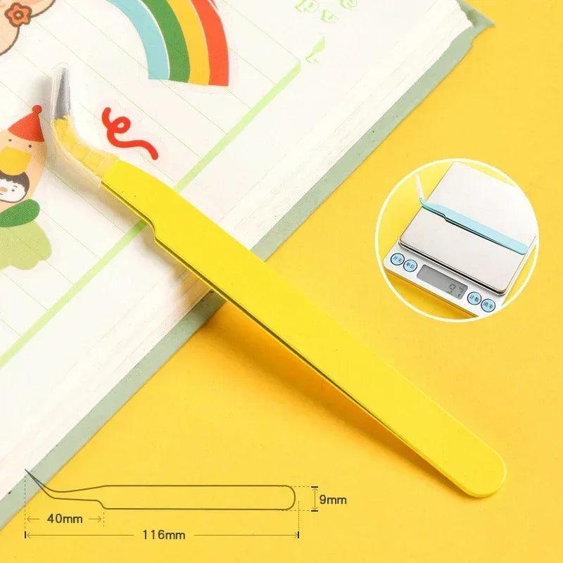 Curved stainless steel tweezer with yellow handle and fine pointed tip