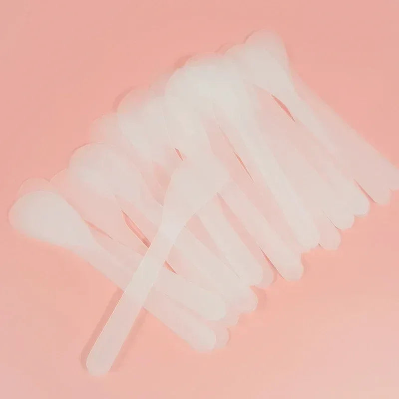 White facial mask mixing spatula sticks, scoops with slender handles