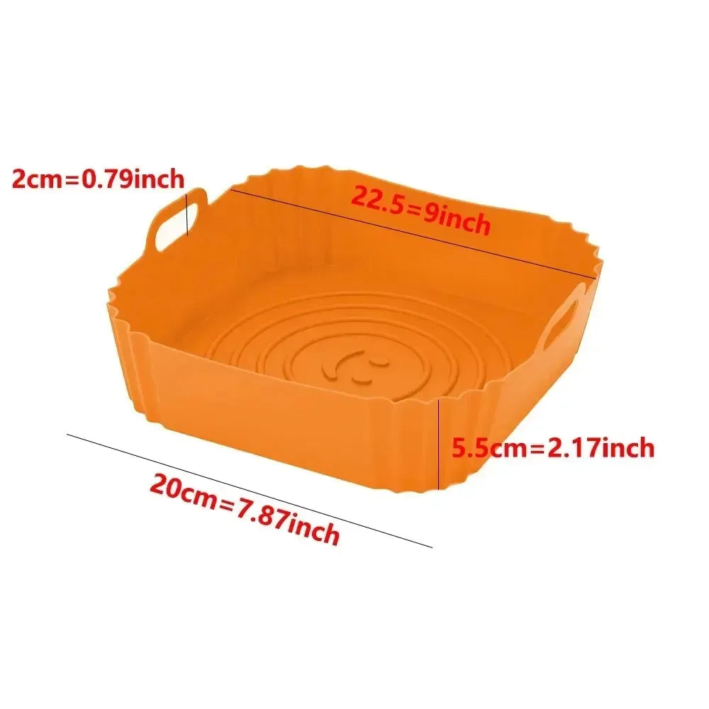 Reusable silicone air fryer liner basket, orange with circular embossed base and handle