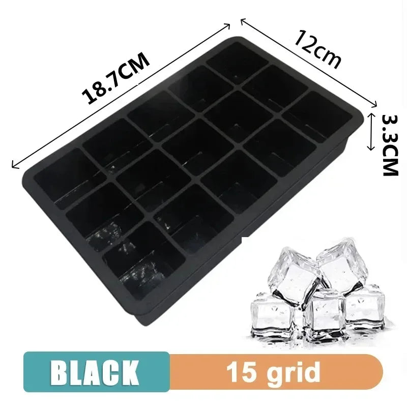 Black silicone ice cube tray mold with square grid cavities and ice cubes inside