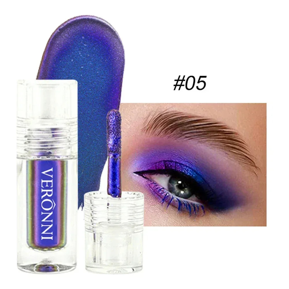 Liquid multichrome eyeshadow in #05, violet-blue shimmer tube with doe-foot applicator and bottle