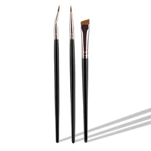 Three eyeliner brushes with brown bristles, black handles and silver ferrules