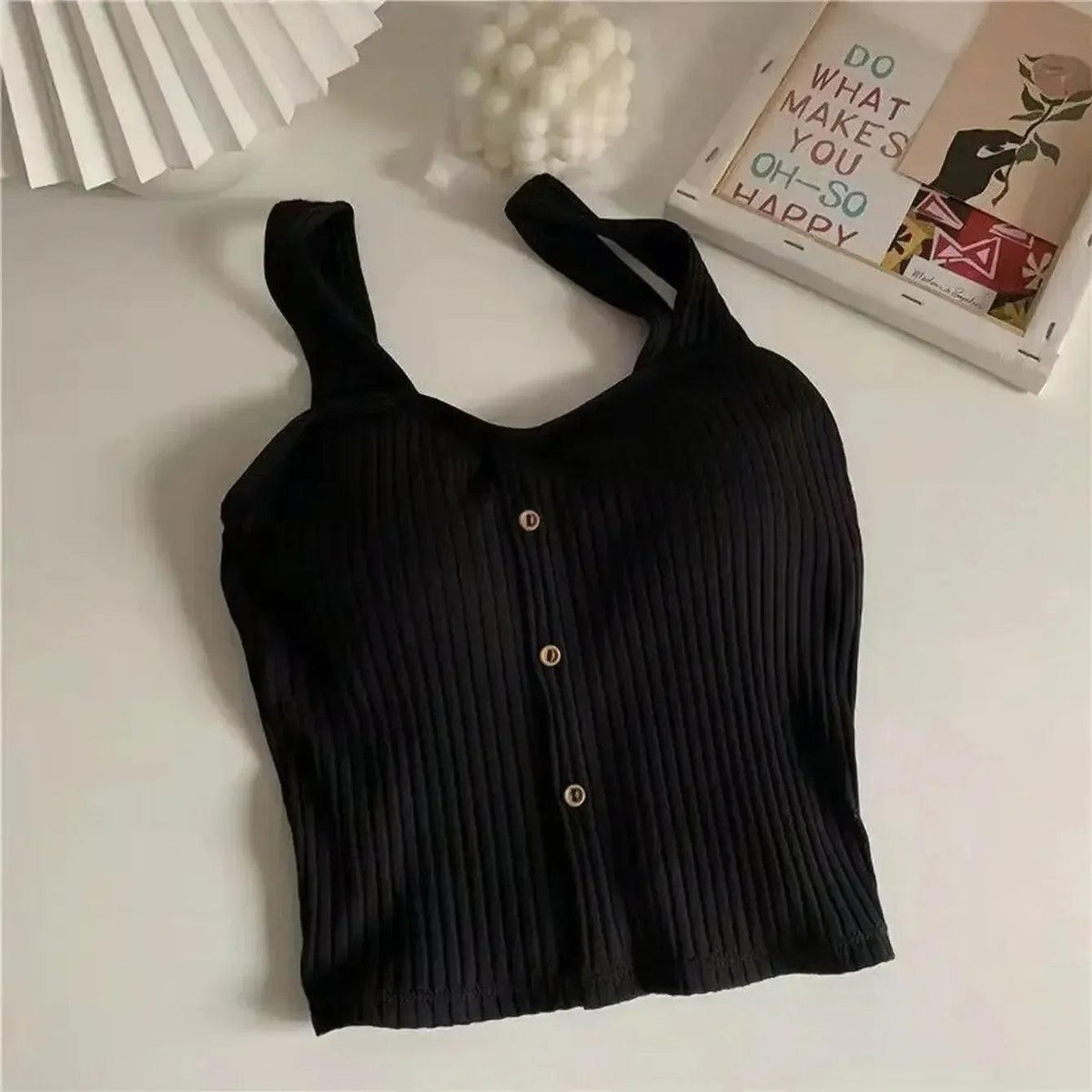 Black ribbed cropped camisole with button-front and wide V-neck straps