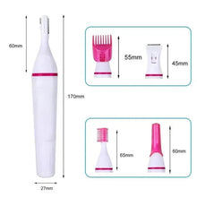 White hair trimmer with red band and accessory heads shown with measurements