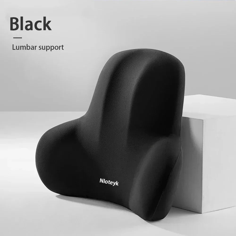 Car lumbar back support cushion in memory foam, black, contoured.