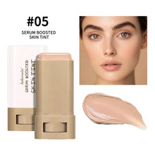 Foundation stick, shade #05 serum boosted skin tint; light tan stick with swatch.