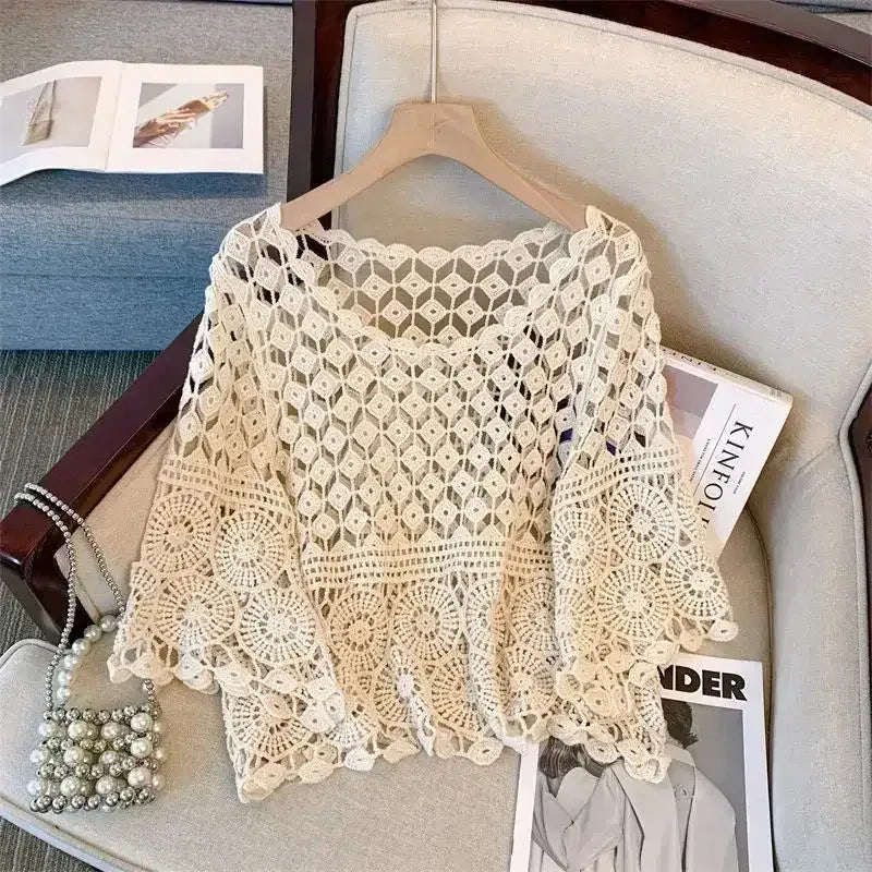 White crochet lace half-sleeve top with open diamond pattern and lace trim