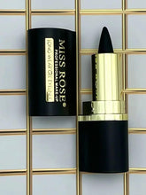 Black eyeliner gel stick and black eyeliner tube with gold accents