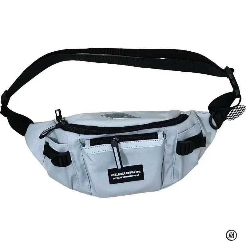 Light gray reflective chest bag with black adjustable strap and front zipper pocket