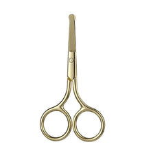 Gold-tone manicure scissors side view with pointed tip and round finger loops.