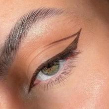 Brown waterproof matte eyeliner line with winged shape across the eyelid