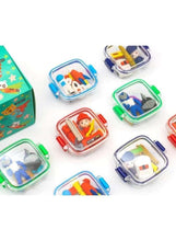 Set of four mini lunch box erasers with character figures in clear colored trays