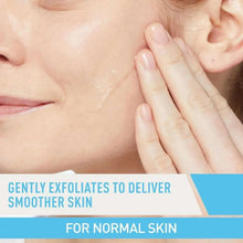 Person applying cleanser to face with fingertips for gentle exfoliation