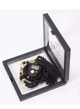 Black bead prayer beads with digital tally counter, tassel, and gold charm accents