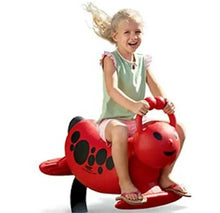 Red ladybug spring rocking toy with black spots, child riding