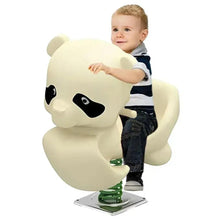 Panda rocking toy, cream with black eye patches; child riding on green spring base