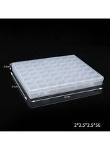 Closed transparent plastic organizer box with grid compartments and carry lid