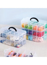 Two translucent three-tier storage boxes with gray carry handles