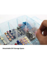 Open translucent three-tier organizer box with small compartments and beads inside