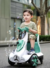 Kids electric car with white-and-green body, round wheels and front grille