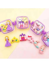 Assorted mini erasers with princess, bunny, and toy figures in small purple cases