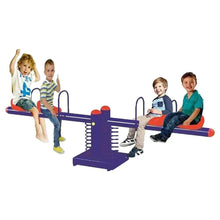 Blue metal 4-seater seesaw with four red seats, upright handles, and spring base