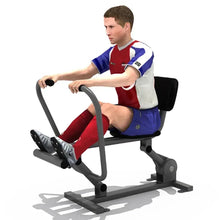 Rowing machine trainer with foot straps and console; person seated in blue red outfit.