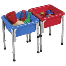 Kids water play table with blue and red bins, assorted toys inside