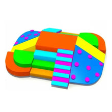 Colorful foam kids activity climber with slide ramp, blocks, and curved platform.