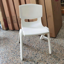 Kids plastic chair in white, angled view with armrests and solid legs