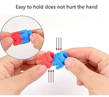 Colorful interlocking block pieces held together in hands