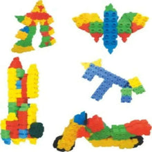 Colorful building blocks set with assembled shapes: star, cross, plane, and figures