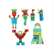 Colorful building blocks set with assembled robot, figure, and house-like models