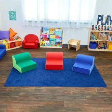Kids foam lounge chair set with green, red, and blue chairs on a floor mat