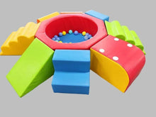 Kids foam play tent with hexagonal ball pit, blue blocks, and slide ramp
