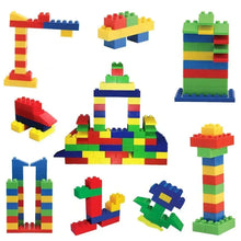 Colorful plastic block building set pieces forming multiple towers and figures