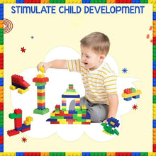 Child playing with colorful plastic block building pieces on a foam play mat