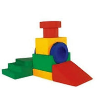 Kids indoor climbing play set of red, yellow, green foam blocks with purple tunnel.