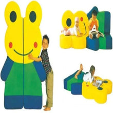 Yellow frog-shaped kids plush with big black eyes, green torso, and blue arms and legs