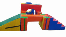Multicolor foam obstacle course with tunnel arch, raised frame, and slide blocks