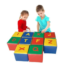 Foam alphabet cubes with printed letters on multicolor faces, stacked in a block