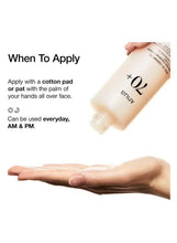 Milky toner on a hand, shown being applied across the face